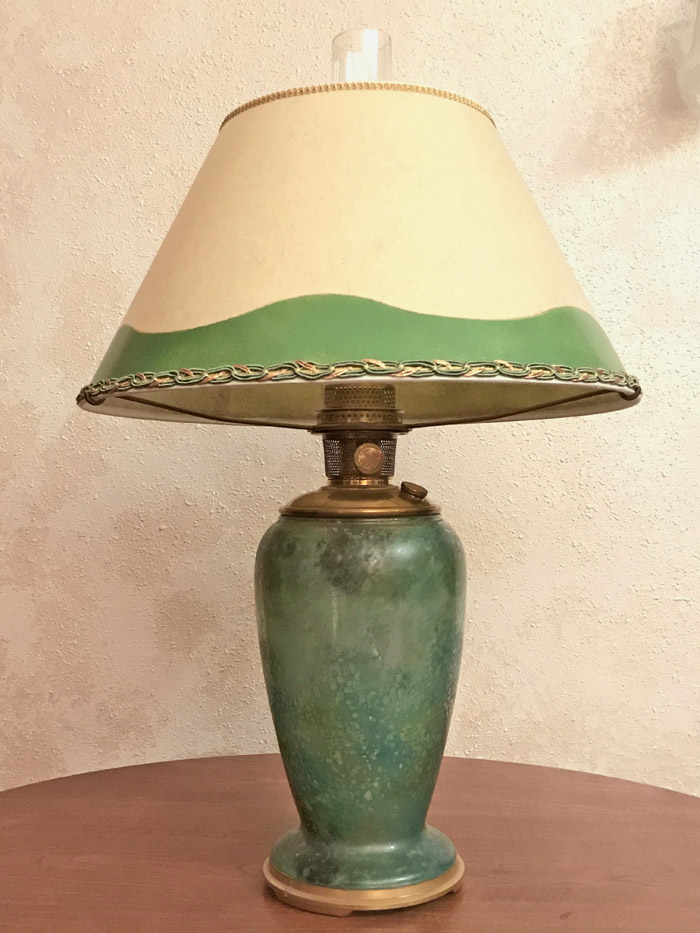 The aladdin 12 inch variegated verde vase lamp was manufactured in